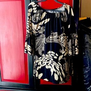 Light silky feeling dress that doesn’t wrinkle.